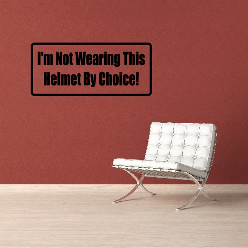 Rectangular helmet warning decal with bold black text: I'm Not Wearing This Helmet By Choice!