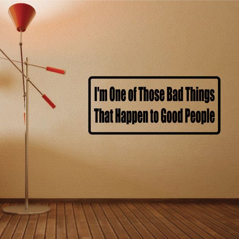 Rectangular wall decal with black border, beige background, and bold white quote text.
