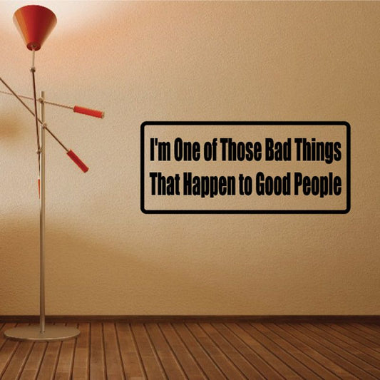 Rectangular wall decal with black border, beige background, and bold white quote text.