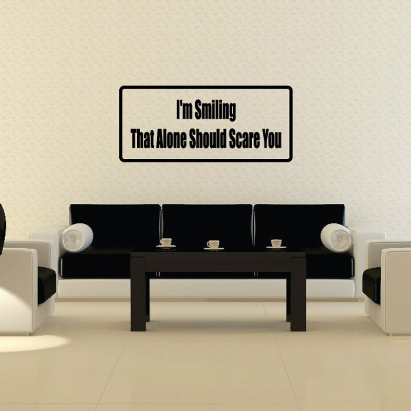 Humorous wall decal with "I'm Smiling" and "That Alone Should Scare You" text