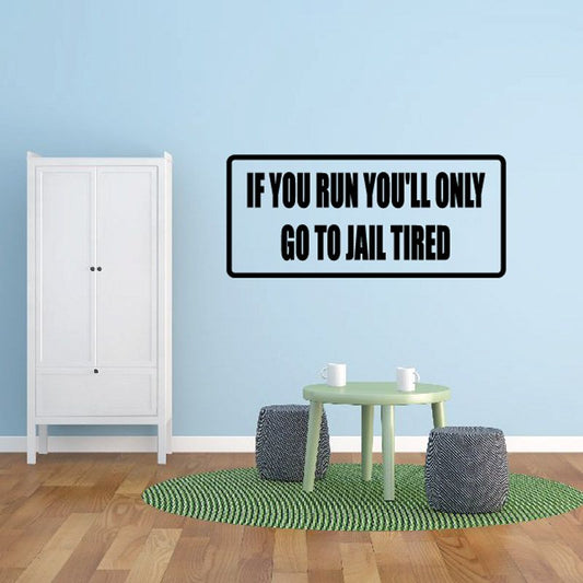 Rectangular wall decal with black outline and bold uppercase text