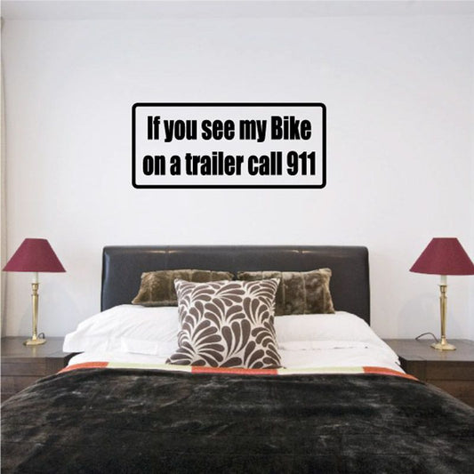 Bike trailer warning decal with "call 911" message