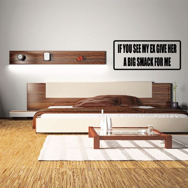 Wall decal with bold quote text in black and white, framed by black border