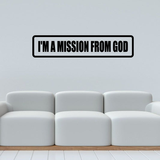 Vinyl wall decal with bold text “I'M A MISSION FROM GOD” in black and white
