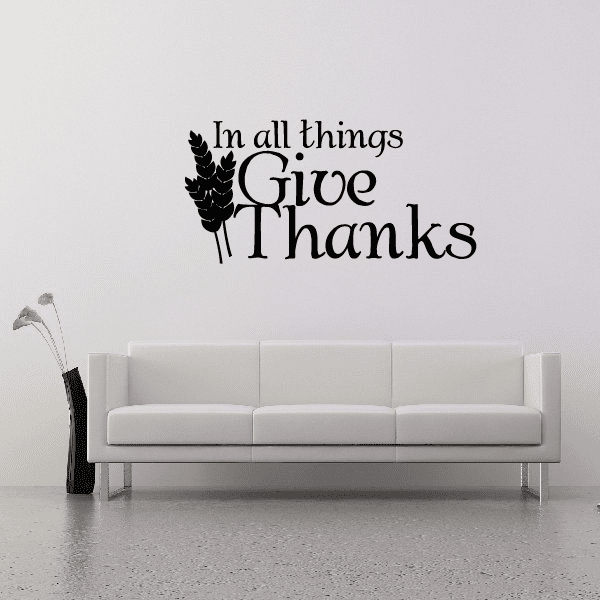 Black wall decal: “In all things Give Thanks” with leaf sprig