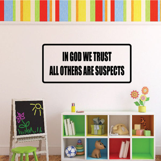 Wall decal with black border text: IN GOD WE TRUST, ALL OTHERS ARE SUSPECTS