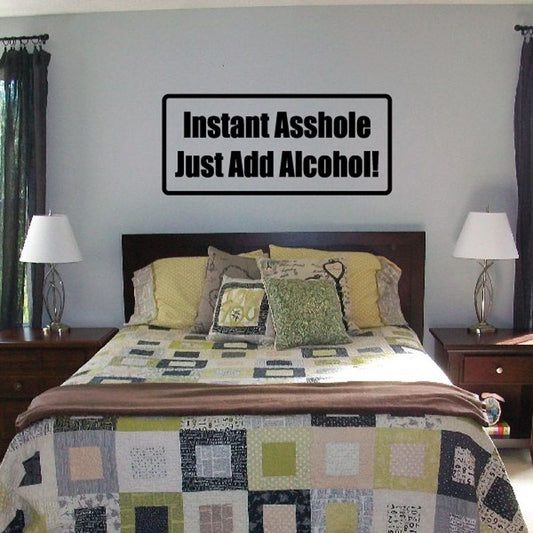 Rectangular black-and-white wall decal reading “Instant Asshole Just Add Alcohol!”