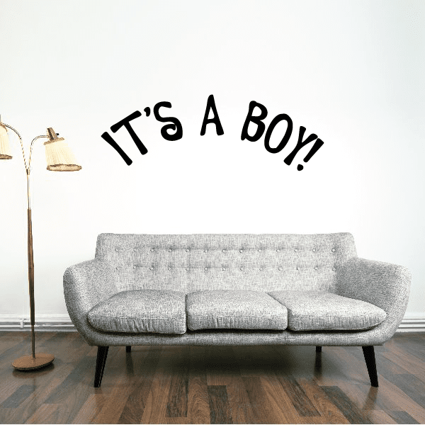 Black script wall decal reading “It’s A Boy!”