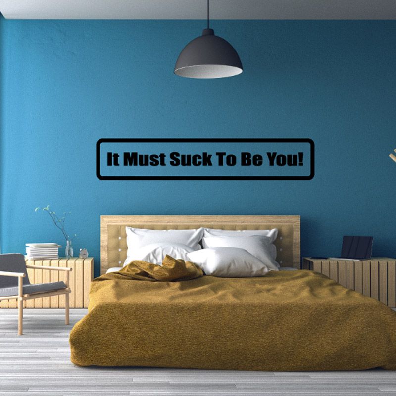 Rectangular wall decal with bold black border and text: “It Must Suck To Be You!”