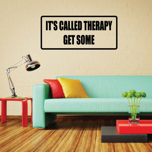 Wall decal rectangle with black border and bold text: "IT'S CALLED THERAPY" "GET SOME"