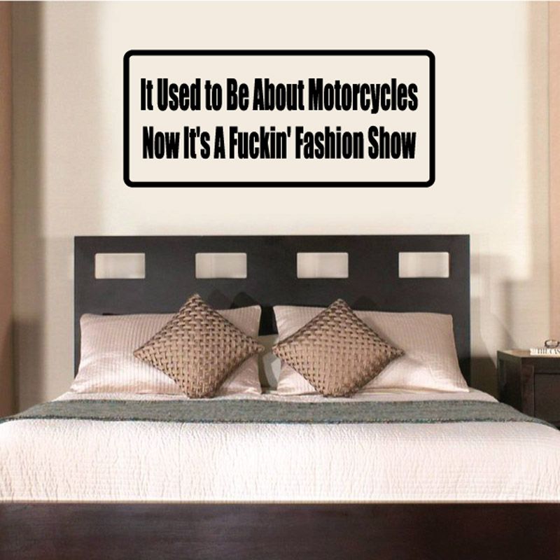 Black-bordered rectangular wall decal with bold white text