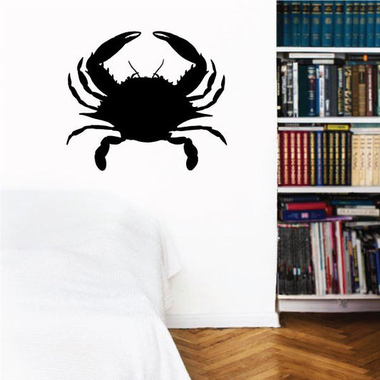 Black crab decal with raised claws and legs, wall sticker design