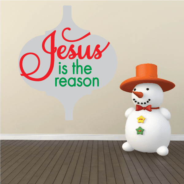 Cross-shaped wall sticker with red “Jesus” script and green “is the reason” text