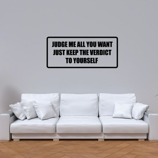Black wall decal with bold text in a rectangular outline
