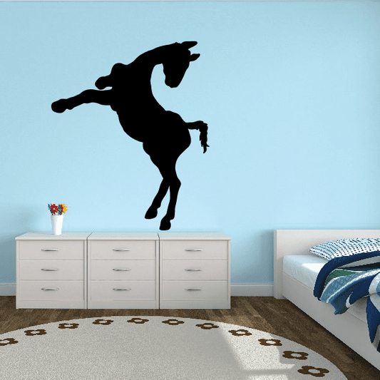 Black jumping foal silhouette decal for walls