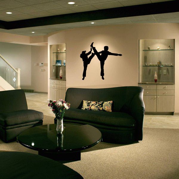Karate wall vinyl decal with black karate fighter silhouette holding arm pose