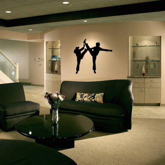Karate wall vinyl decal with black karate fighter silhouette holding arm pose
