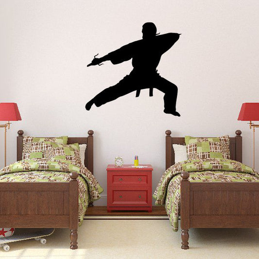 Karate fighter wall vinyl decal, black silhouette in dynamic kick pose