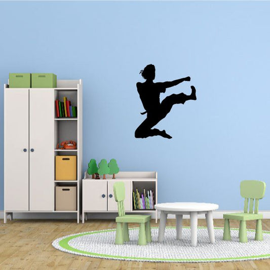 Karate wall decal vinyl sticker with black martial arts silhouette kicking pose