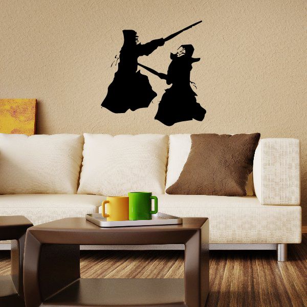 Karate wall decal: two black silhouette karate fighters with weapons