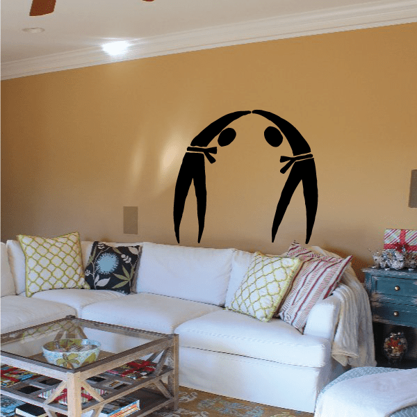Black karate-themed wall decal of a figure with raised fists, vinyl sticker design
