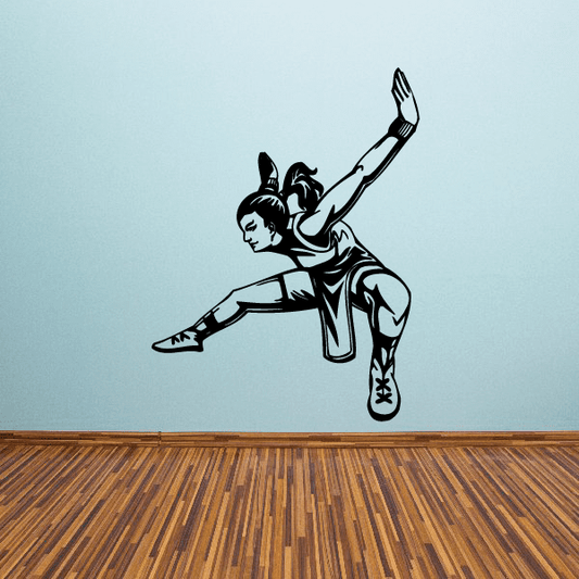 Karate wall decal of a black karate fighter mid-kick, vinyl die-cut sticker