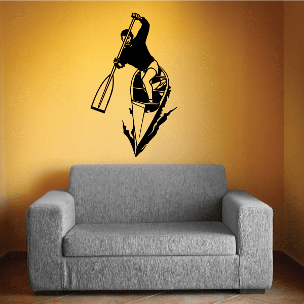 Kayak wall decal with black silhouette of kayaker holding paddle