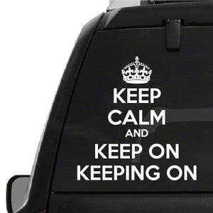White vinyl wall decal: crown above “KEEP CALM AND KEEP ON KEEPING ON”
