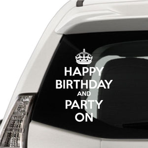 Happy birthday party decal with crown and white text on black window
