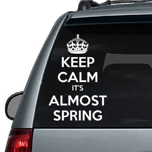 Car window decal with crown and text "Keep Calm It's Almost Spring"