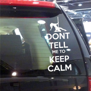 Car window decal: white 'DON'T TELL ME TO KEEP CALM' lettering with figure