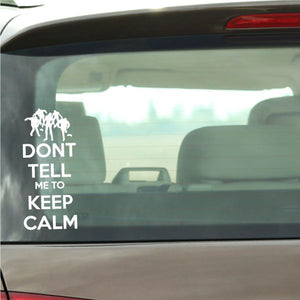 Car window decal with zombie silhouettes and "Don't tell me to keep calm" text