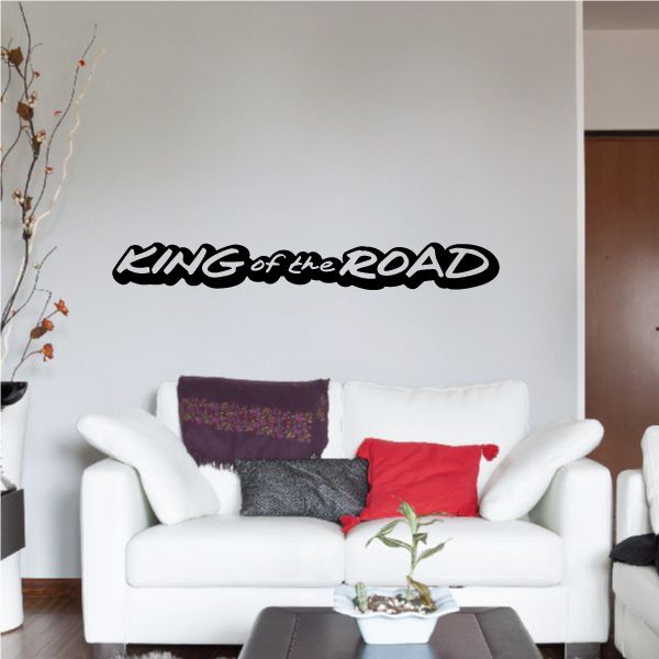 Black wall decal text "KING of the ROAD" with stylized lettering