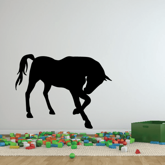 Kneeling horse decal, black silhouette of a horse kneeling with head low.