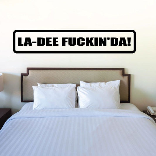 Vinyl decal with bold text "LA-DEE FUCKIN' DA!" in black and white