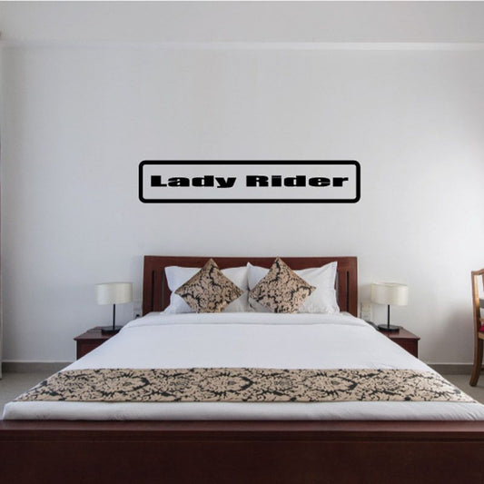 Lady Rider wall decal with bold black text on white background