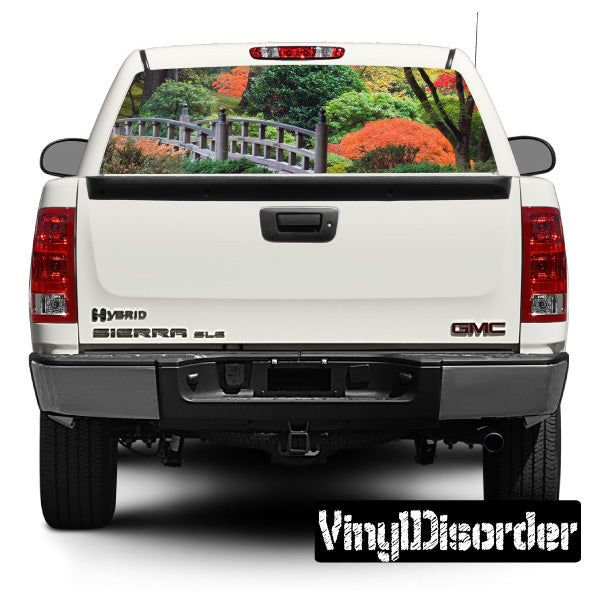 Rear window landscape graphic decal with bridge, trees, and colorful foliage