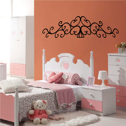 Ornate vine-style wall decal with central medallion, black