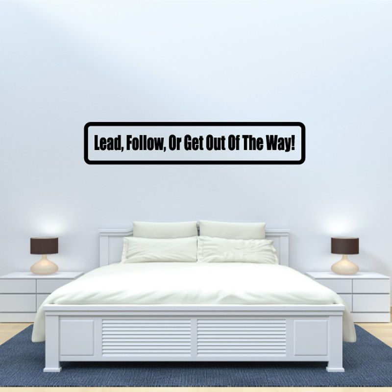 Wall decal with black-outlined label reading 'Lead, Follow, Or Get Out Of The Way'.