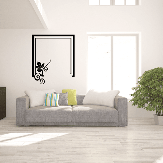 Leaf wall art vinyl decal in black frame with vine and flower motif