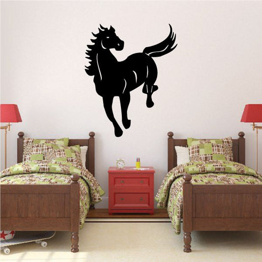 Leaping horse wall decal, black silhouette with raised front legs and tail