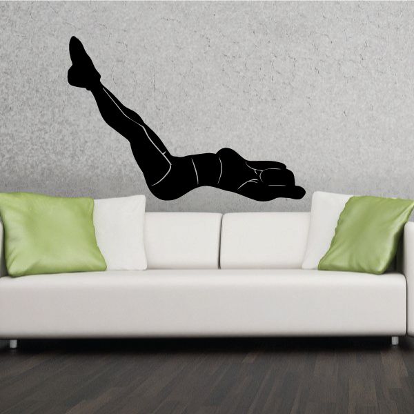 Black fitness wall decal showing a leg-lift exercise pose silhouette