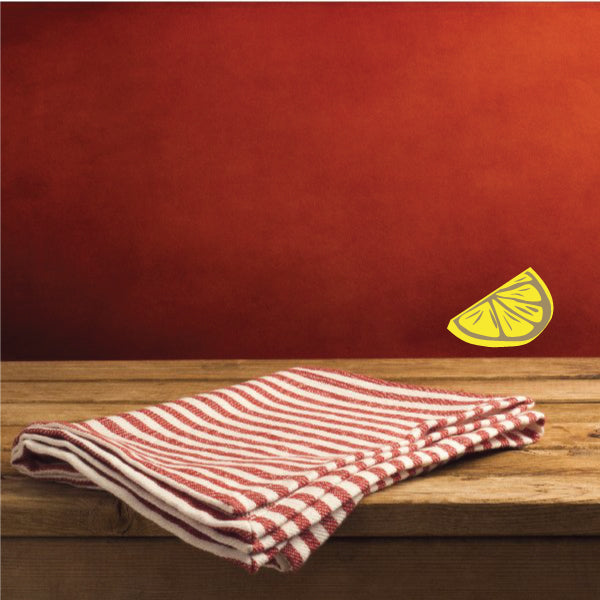 Small yellow lemon slice wall sticker with green seed pattern