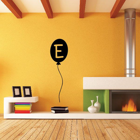 Letter E balloon decal with black balloon and yellow letter E