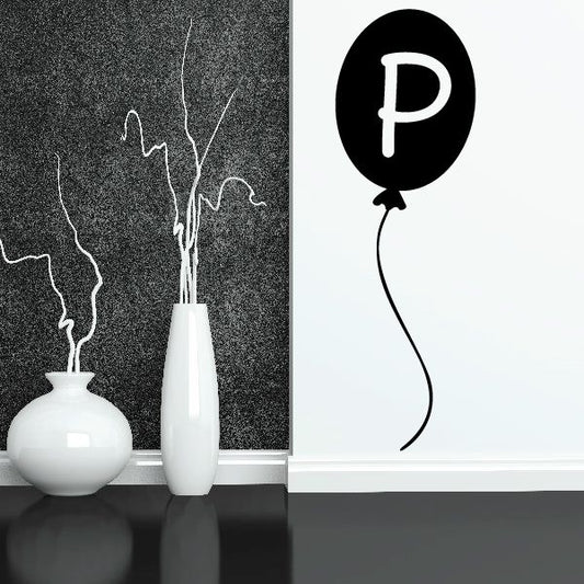 Letter P balloon decal, black circle with white letter P and small balloon tail