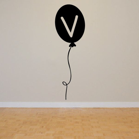 Black letter V balloon decal with attached balloon string and curly tail