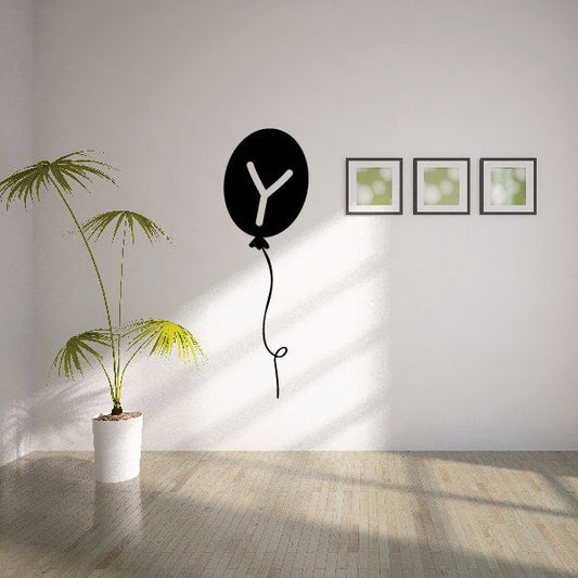 Letter Y balloon decal with black balloon and white Y, curved string