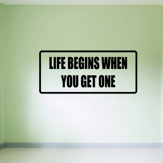Wall decal with bold text "Life begins when you get one"