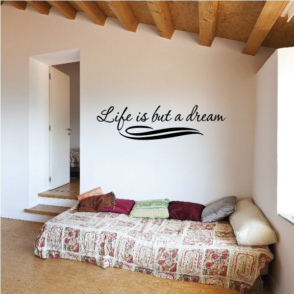 Wall decal: cursive “Life is but a dream” with sweeping underline