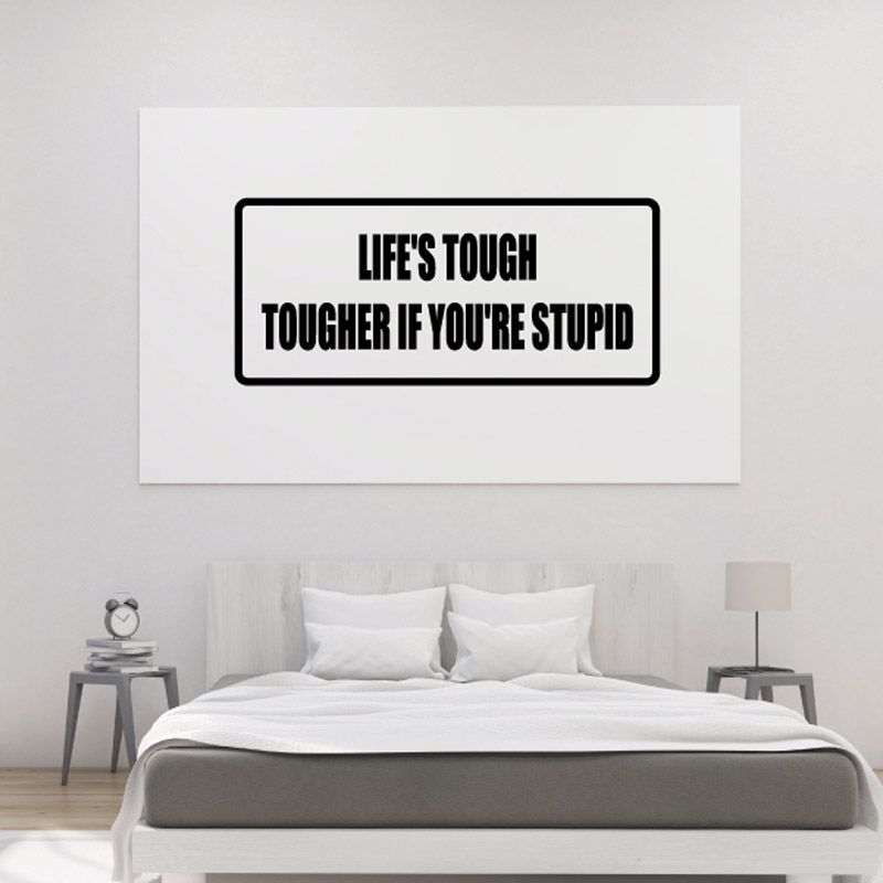 Wall decal with bold black quote: “LIFE'S TOUGH TOUCHER IF YOU'RE STUPID”